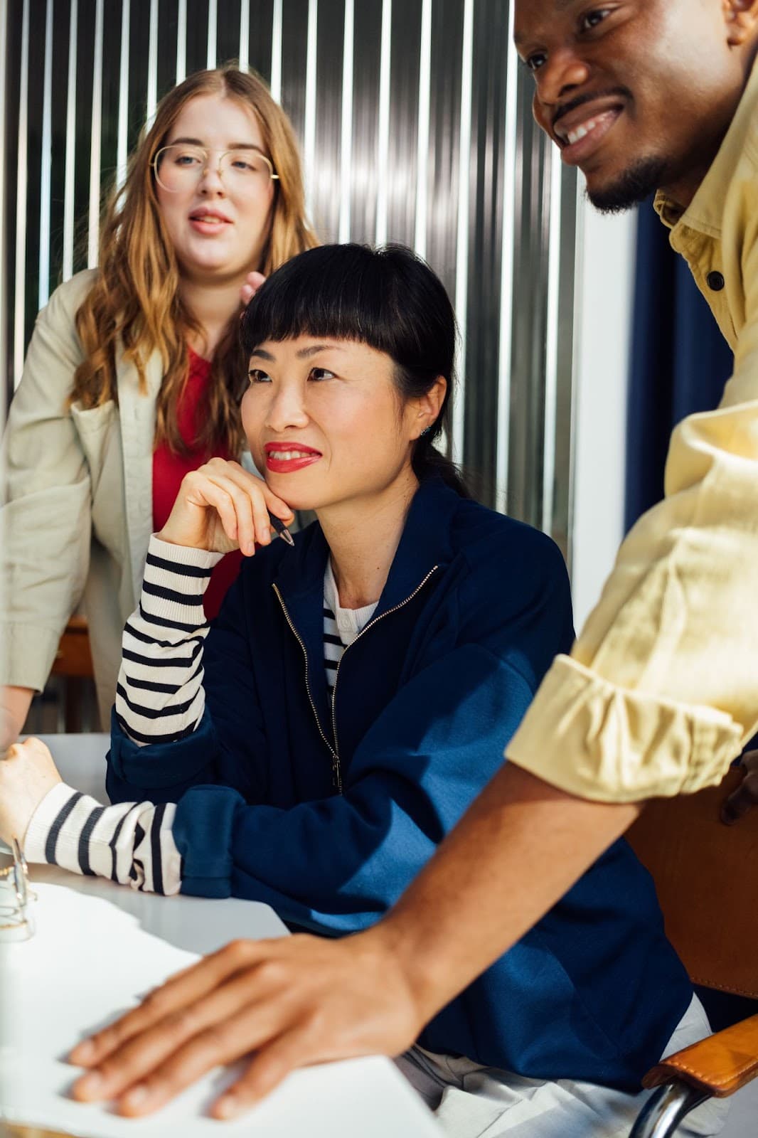 Group of people discussing work. 