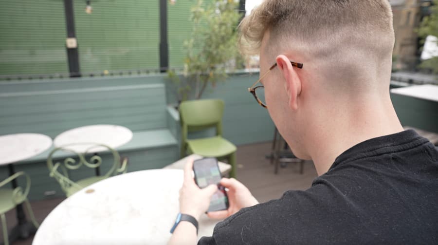 Jack Hunt is on his phone.