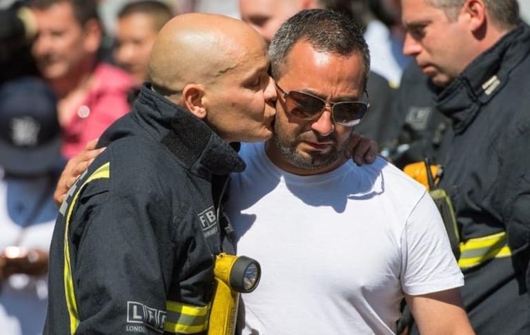Firefighter David Badillo (left) with Manfred Ruiz Credit: David Badillo